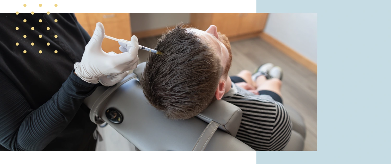 Patient receiving hair restoration treatment